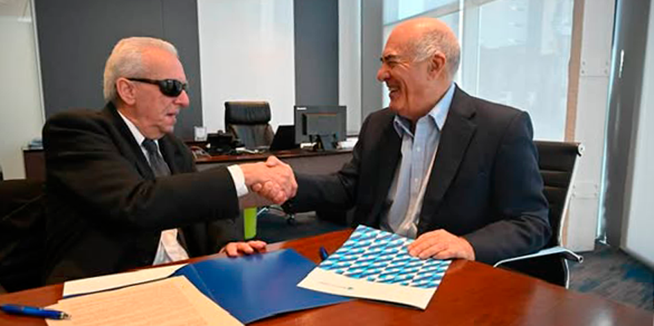 Eduardo Awad (APCCRA) y Gustavo Cardoni, gerente general del Banco Ciudad de Buenos Aires [Foto redes sociales Awad]