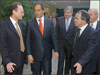 Dr. Mario Mario Elkouss, presidente de FECIBA; el Sr. Daniel Scioli, vicepresidente de la nacin; el secretario de FECIBA, Adm. Jorge Hernndez y el Sr. Marcelo Fernndez, presidente de la CGE.